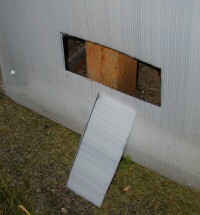 Hole cut for the base vent in a solexx greenhouse