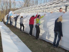 Installing Solexx greenhouse covering at Upshur High School in Buckhannon, West Virginia