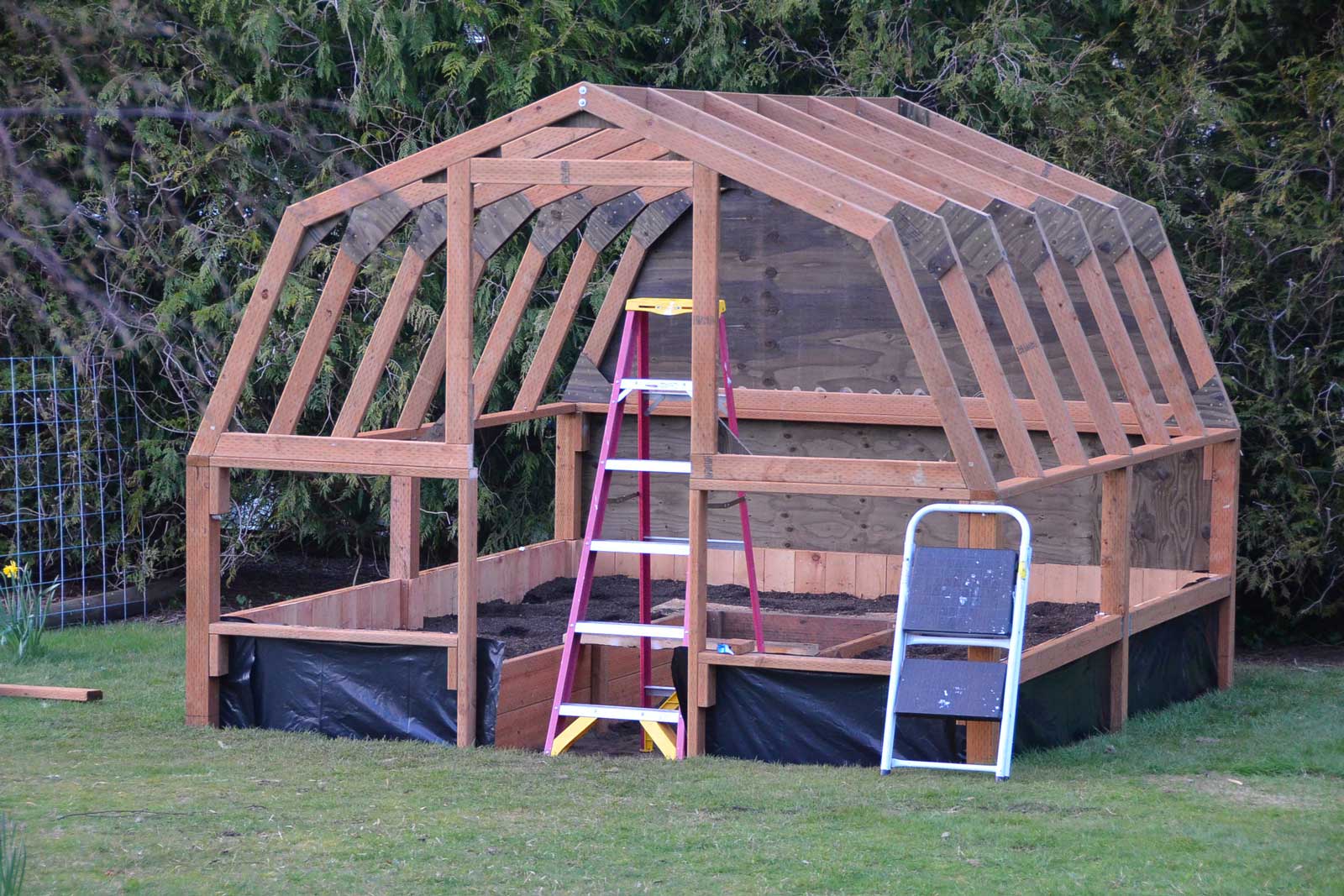 Wooden greenhouse frame ready to skin with Solexx twin-wall covering
