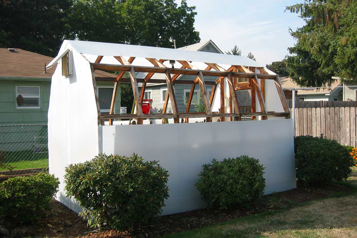 Greenhouse using solexx panels for privacy in their backyard