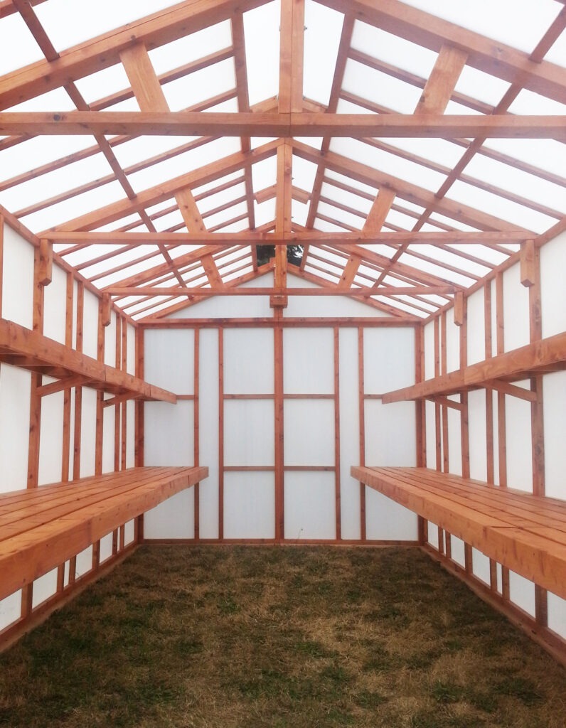 Wood frame greenhouse with Solexx in oregon. Interior view.