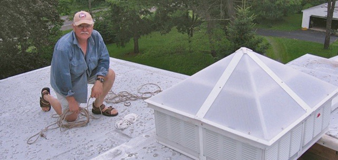 Solexx greenhouse covering plastic panels used to cover an attic roof vent