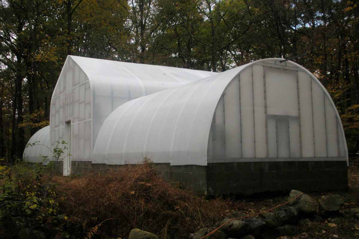 Multi unit greenhouse structure with Solexx rolls