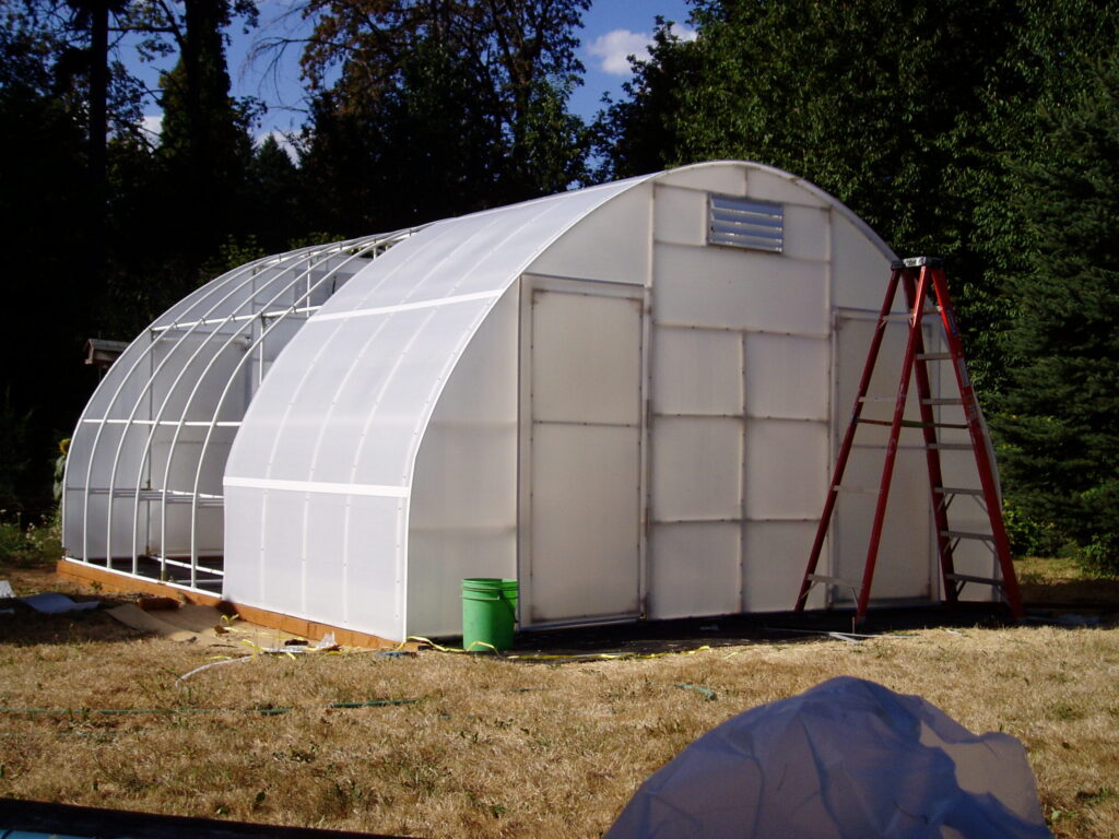 Top Solexx panels being added to the greenhouse